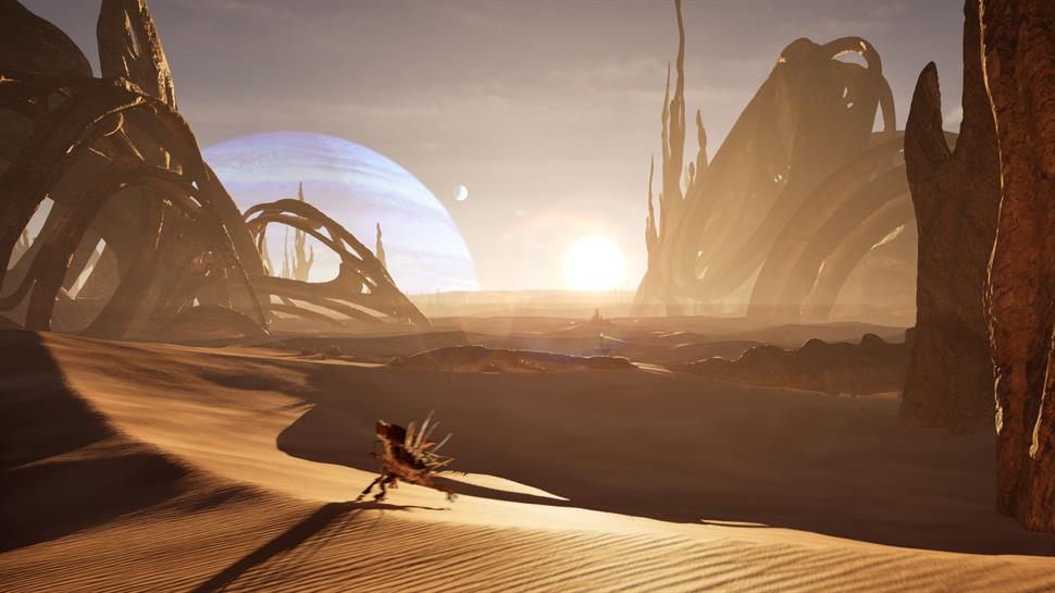 Hiker with a map looking out over a mountain range